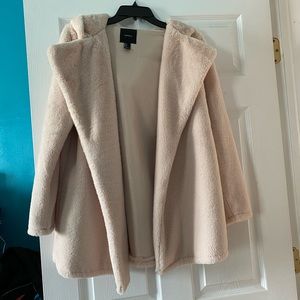 Blush hooded faux fur coat